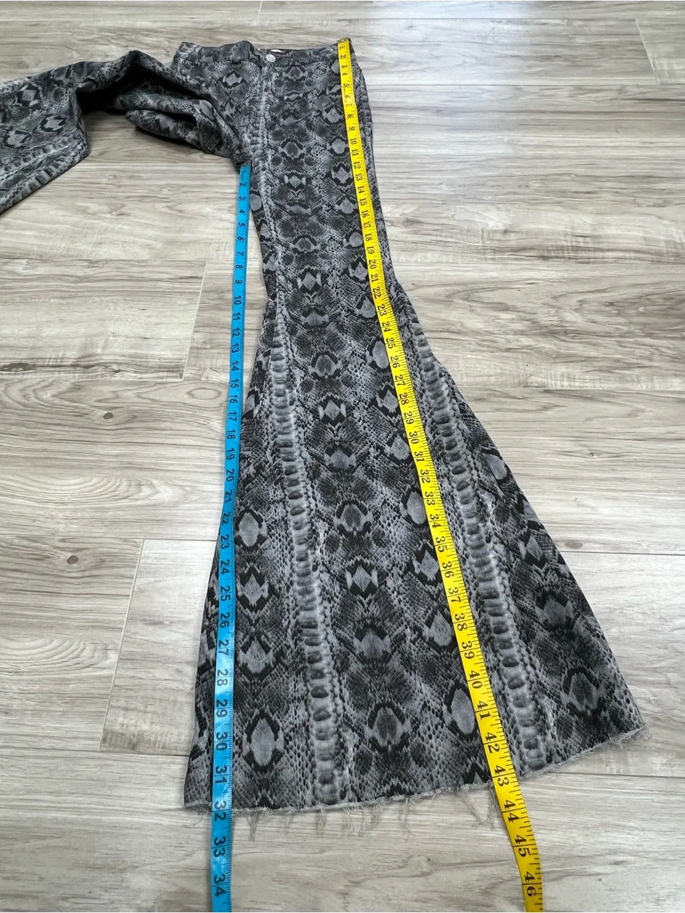 We The Free Free People Just Float On Snake Print Flare Bell Bottom Jeans
